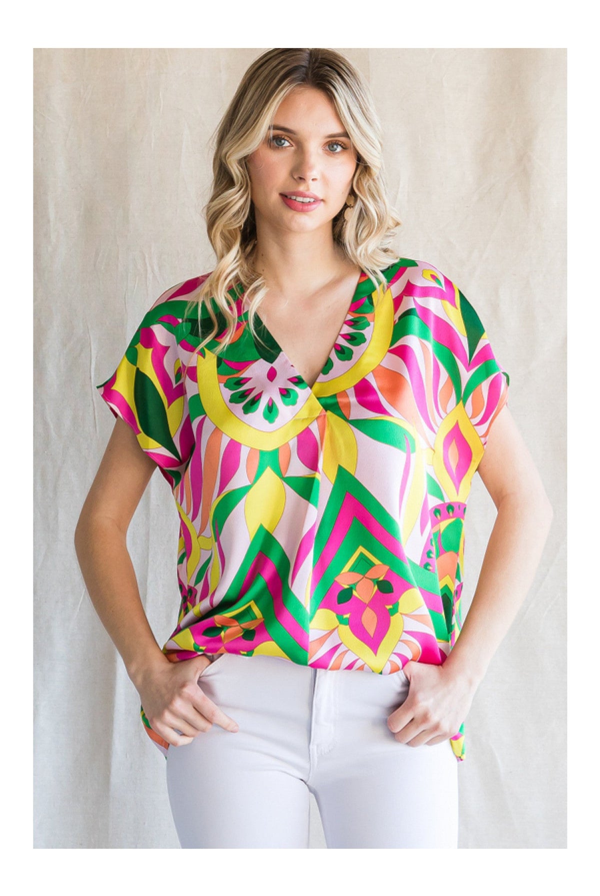 Jodifl Bright Pink Mix Print Top With A V-Neckline And Short Curved Sleeves-Tops-Jodifl-Deja Nu Boutique, Women's Fashion Boutique in Lampasas, Texas