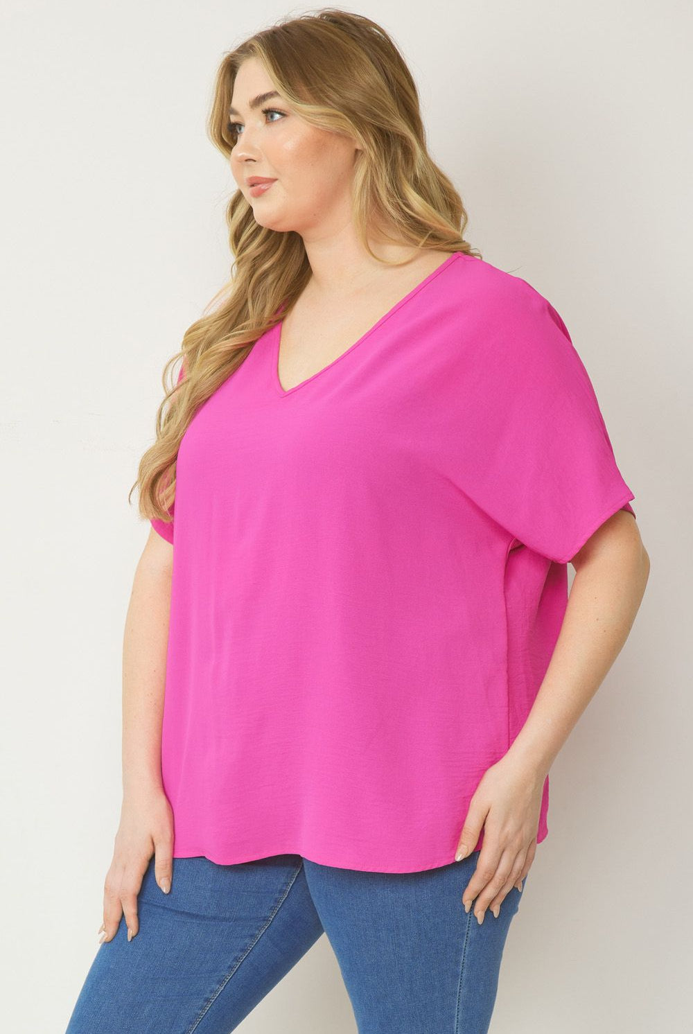 Entro Solid V-Neck Top Featuring Asymmetric Rounded Hem In Hot Pink Plus-Curvy/Plus Basics-Entro-Deja Nu Boutique, Women's Fashion Boutique in Lampasas, Texas