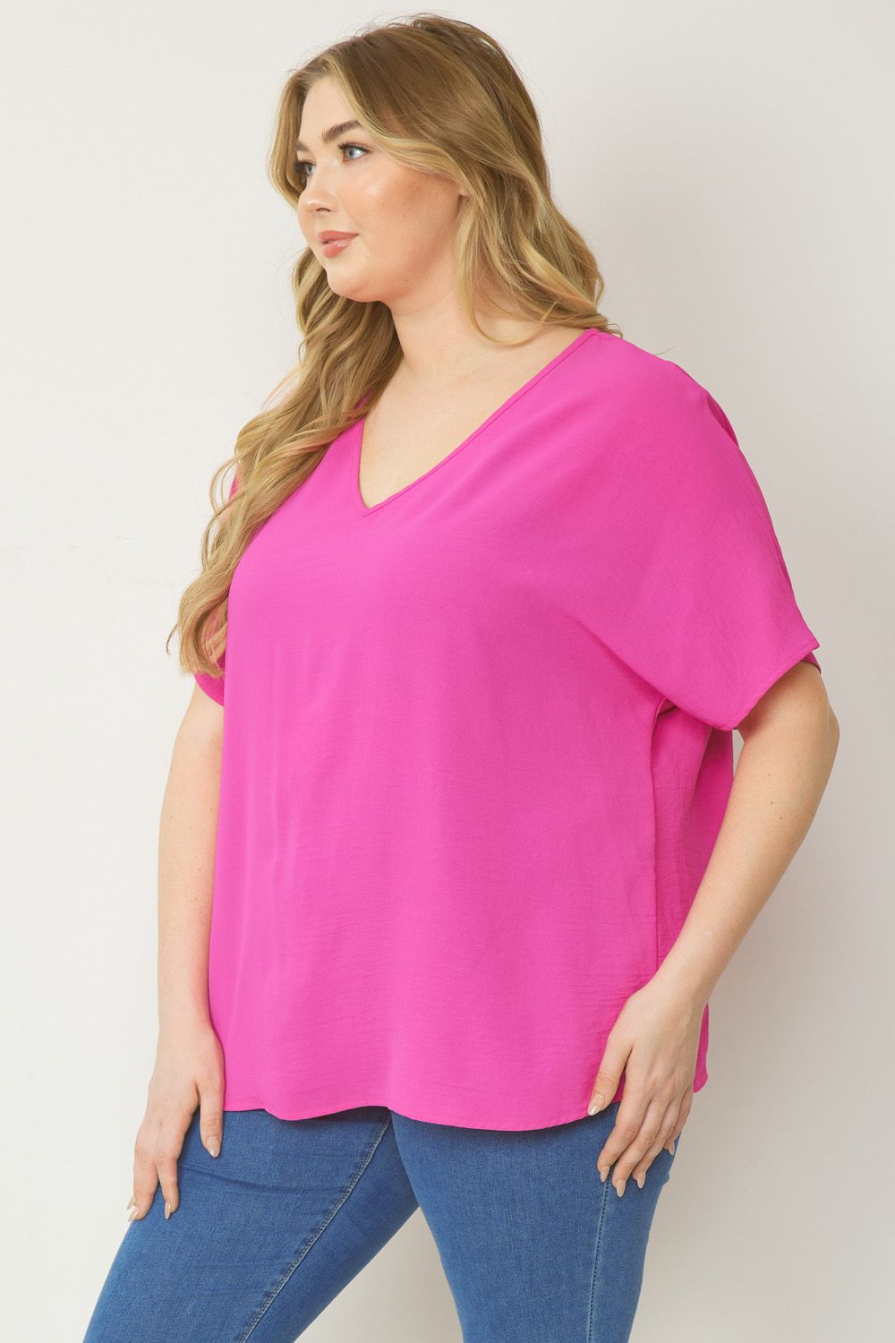 Entro Solid V-Neck Top Featuring Asymmetric Rounded Hem In Hot Pink Plus-Curvy/Plus Basics-Entro-Deja Nu Boutique, Women's Fashion Boutique in Lampasas, Texas