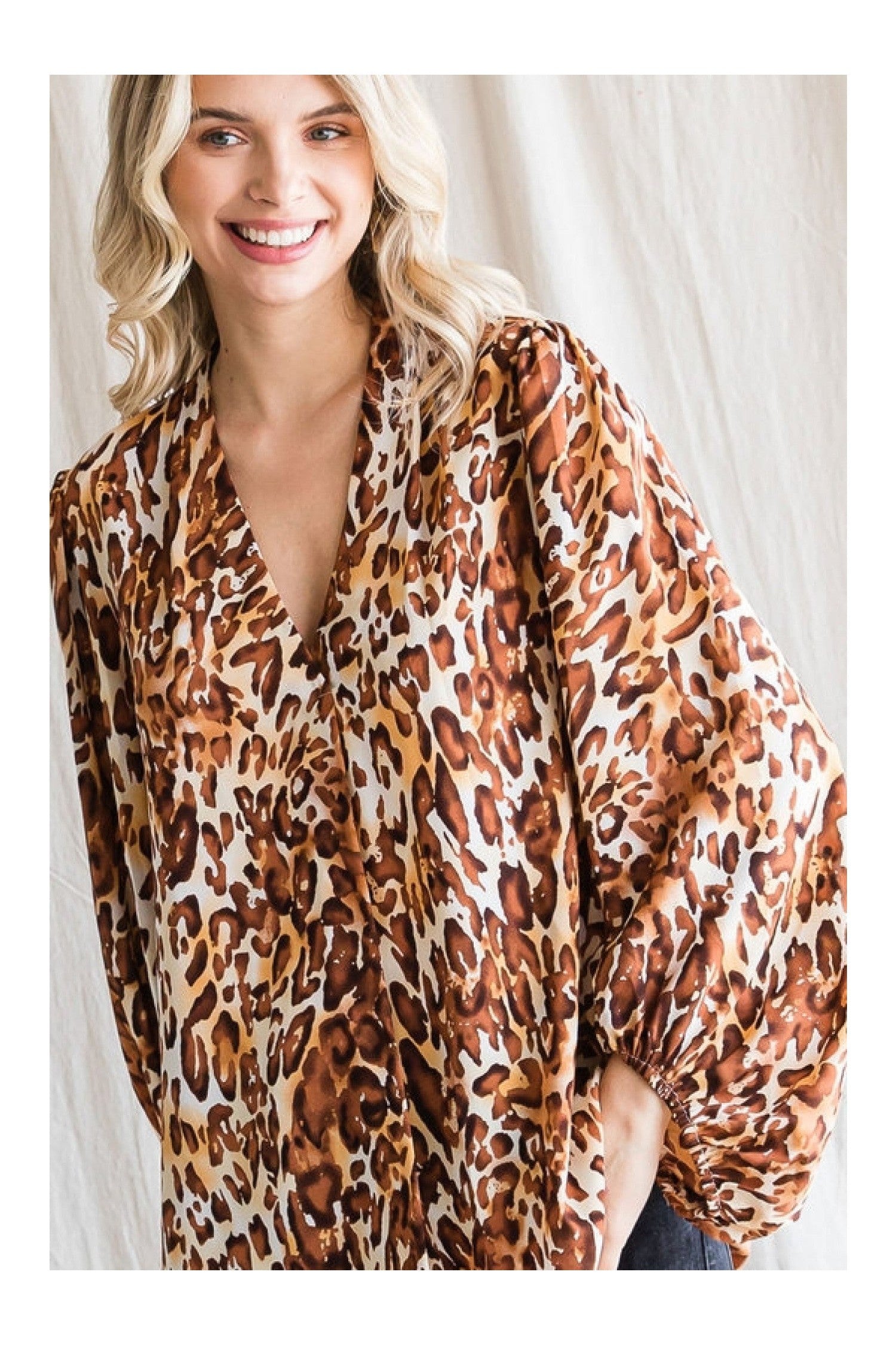 Jodifl Leopard Print Top With A V-Neckline And Long Balloon Sleeves-Long Sleeves-Jodifl-Deja Nu Boutique, Women's Fashion Boutique in Lampasas, Texas