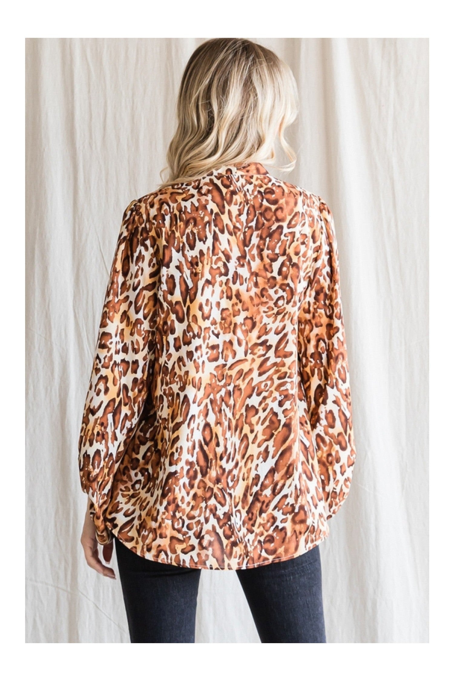 Jodifl Leopard Print Top With A V-Neckline And Long Balloon Sleeves-Long Sleeves-Jodifl-Deja Nu Boutique, Women's Fashion Boutique in Lampasas, Texas