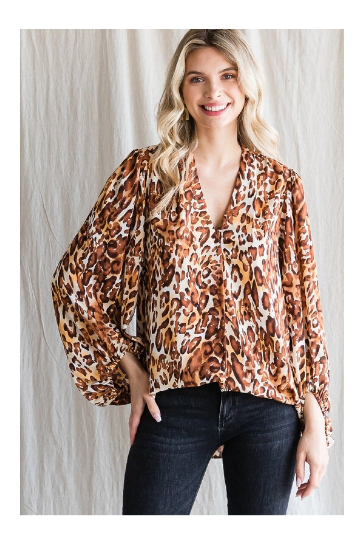 Jodifl Leopard Print Top With A V-Neckline And Long Balloon Sleeves-Long Sleeves-Jodifl-Deja Nu Boutique, Women's Fashion Boutique in Lampasas, Texas