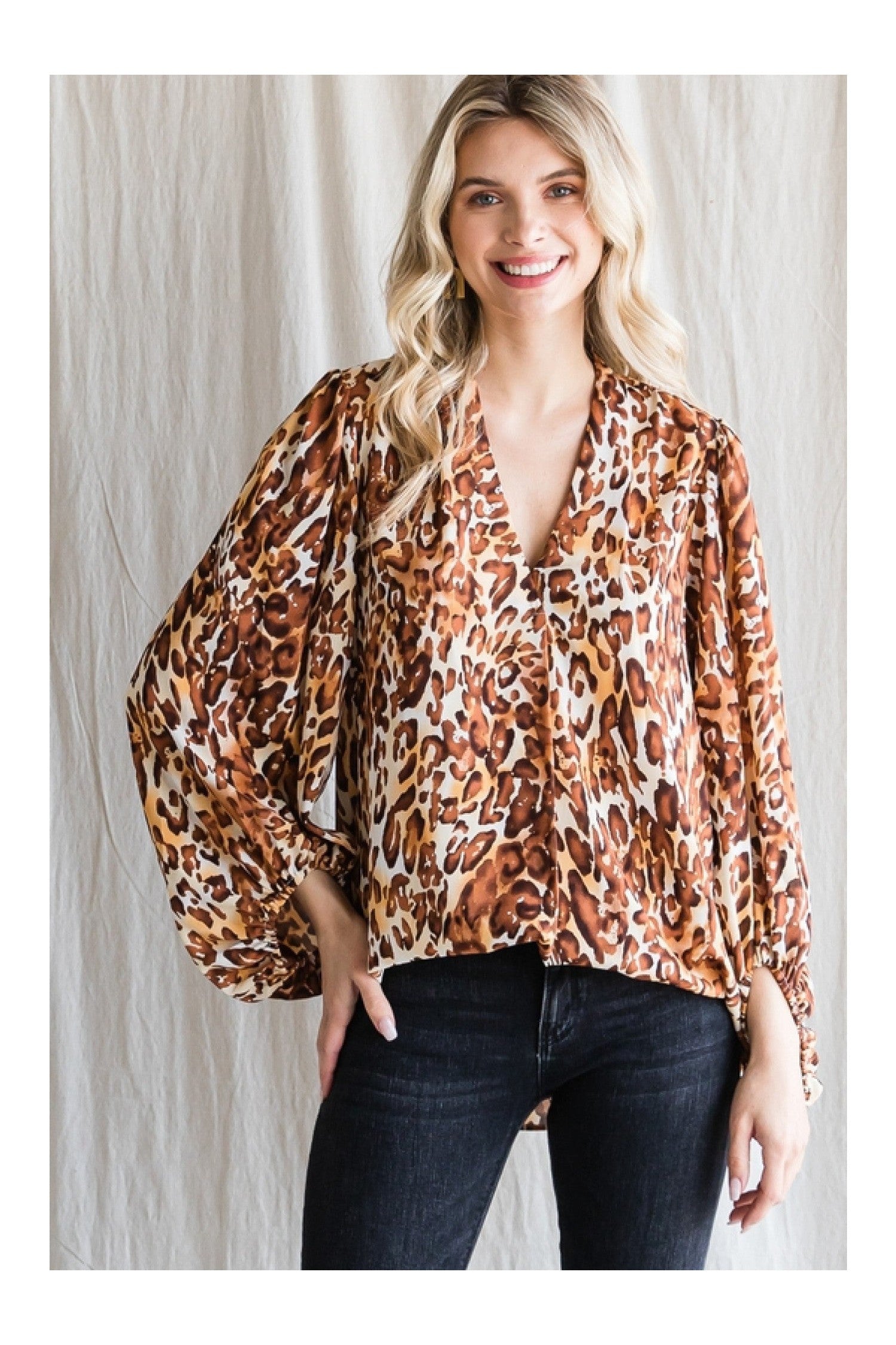 Jodifl Leopard Print Top With A V-Neckline And Long Balloon Sleeves-Long Sleeves-Jodifl-Deja Nu Boutique, Women's Fashion Boutique in Lampasas, Texas