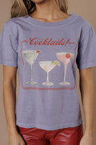 All Us But First Cocktails Wide Neck Tee in Lavender-Tops-All Us-Deja Nu Boutique, Women's Fashion Boutique in Lampasas, Texas