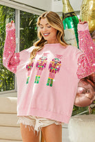 BiBi Sequin Nutcracker Top with Velvet Sequin Sleeves in Pink-Sweaters-BIBI-Deja Nu Boutique, Women's Fashion Boutique in Lampasas, Texas