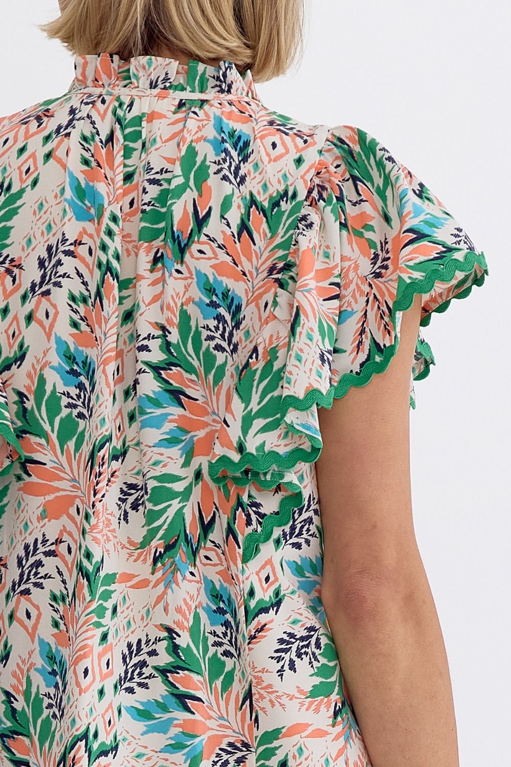 Breezy Blooms: Entro Leaf Print V-Neck Mini Dress With Rick Rack Trimming And Playful Ruffles-Short Dresses-Entro-Deja Nu Boutique, Women's Fashion Boutique in Lampasas, Texas