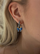 Canvas Style Amber Twisted Blue Enamel Huggie Hoops In Shiny Gold Plated-charm earring-Canvas Style-Deja Nu Boutique, Women's Fashion Boutique in Lampasas, Texas