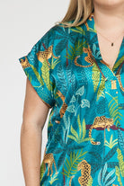 Entro Green Satin Tropical Cheetah Print V-Neck Top Featuring Permanent Rolled Cuffs In Plus-Curvy/Plus Blouses-Entro-Deja Nu Boutique, Women's Fashion Boutique in Lampasas, Texas