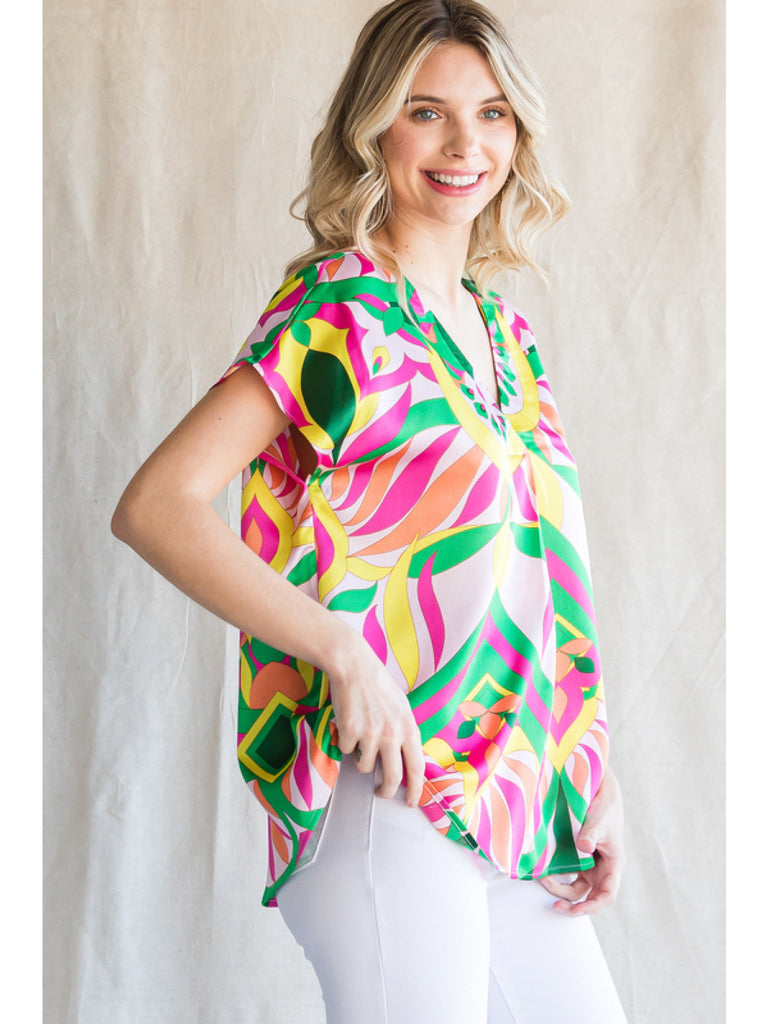 Jodifl Bright Pink Mix Print Top With A V-Neckline And Short Curved Sleeves-Tops-Jodifl-Deja Nu Boutique, Women's Fashion Boutique in Lampasas, Texas