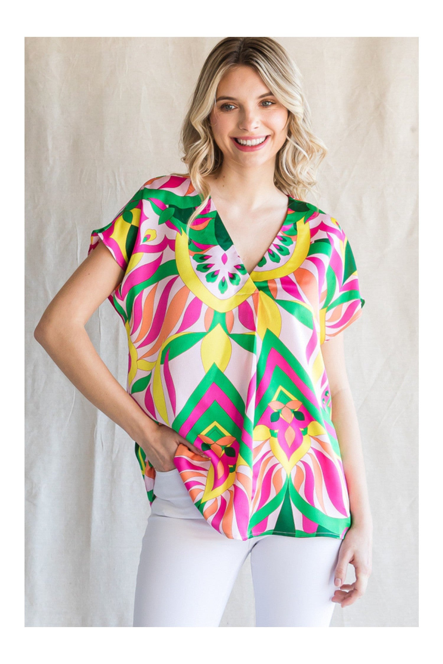 Jodifl Bright Pink Mix Print Top With A V-Neckline And Short Curved Sleeves-Tops-Jodifl-Deja Nu Boutique, Women's Fashion Boutique in Lampasas, Texas