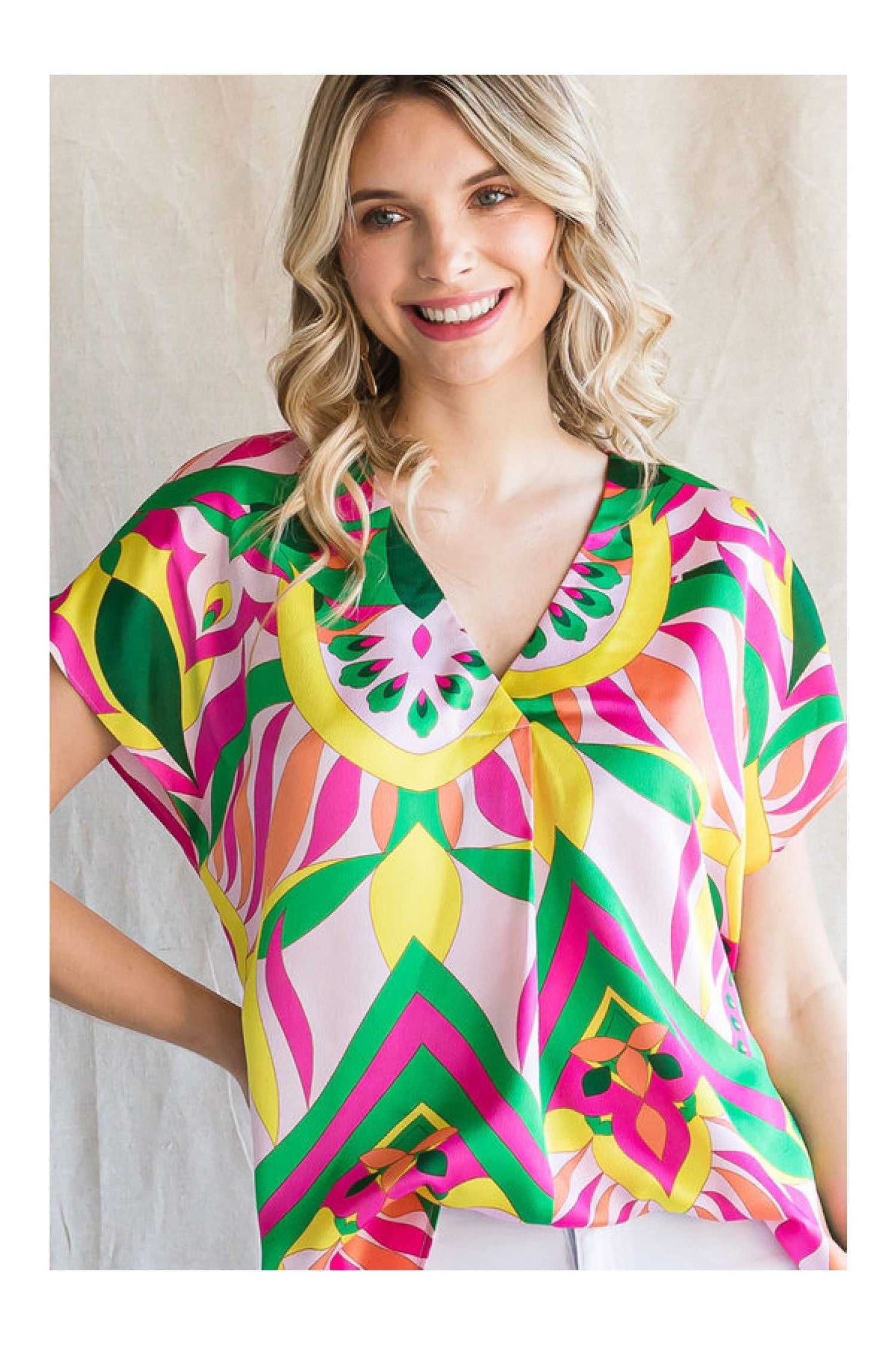 Jodifl Bright Pink Mix Print Top With A V-Neckline And Short Curved Sleeves-Tops-Jodifl-Deja Nu Boutique, Women's Fashion Boutique in Lampasas, Texas