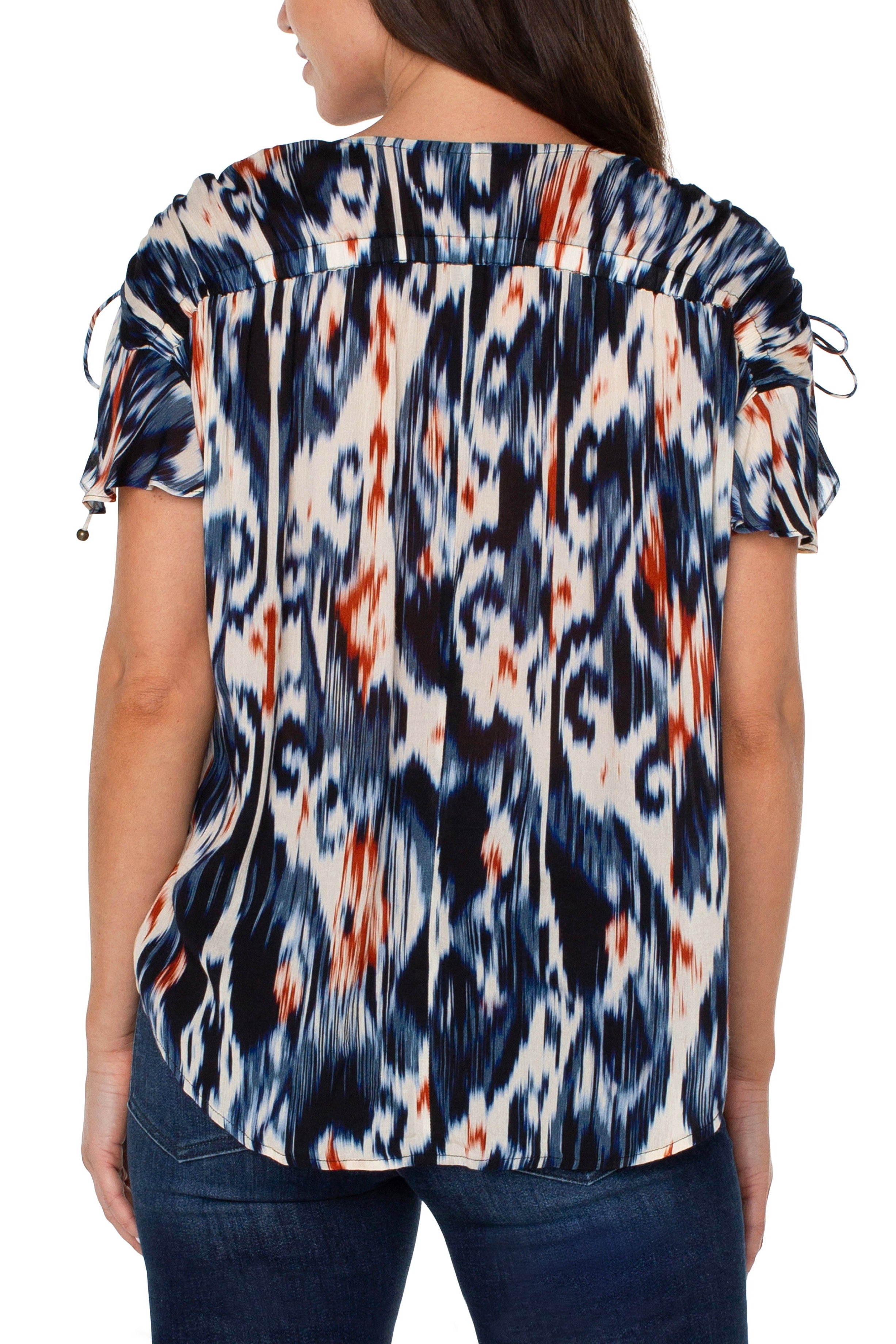 Liverpool Shirred V-Neck Dolman Top With Tie Details In Ikat Print-Tops-Liverpool-Deja Nu Boutique, Women's Fashion Boutique in Lampasas, Texas