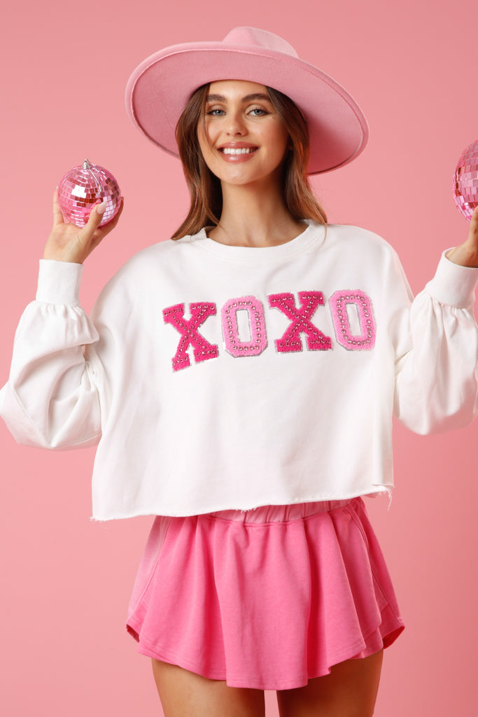 Peach Love Xoxo Sequin Edge Embellished Patch Sweatshirt In White-Sweaters-Peach Love-Deja Nu Boutique, Women's Fashion Boutique in Lampasas, Texas