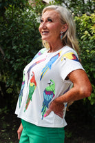 Queen Of Sparkles White Scattered Parrot Tee-Tops-Queen Of Sparkles-Deja Nu Boutique, Women's Fashion Boutique in Lampasas, Texas