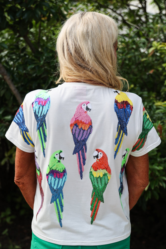 Queen Of Sparkles White Scattered Parrot Tee-Tops-Queen Of Sparkles-Deja Nu Boutique, Women's Fashion Boutique in Lampasas, Texas