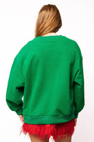 Queen of Sparkles Green Rhinestone Rudolph Wearing A Wreath Sweatshirt-Tops-Queen Of Sparkles-Deja Nu Boutique, Women's Fashion Boutique in Lampasas, Texas