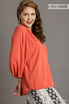 Umgee Notched Neckline Raglan Sleeve High Low Hem Blouse In Deep Coral Plus-Curvy/Plus Tops-Umgee-Deja Nu Boutique, Women's Fashion Boutique in Lampasas, Texas