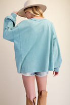 Easel Floral Patch Front Washed Terry Pullover in Dusty Blue-sweatshirt-Easel-Deja Nu Boutique, Women's Fashion Boutique in Lampasas, Texas