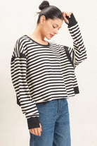 Hyfve Striped Long Sleeve Criss Cross Open Back Top in Black-sweatshirt-Hyfve-Deja Nu Boutique, Women's Fashion Boutique in Lampasas, Texas