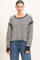 Hyfve Striped Long Sleeve Criss Cross Open Back Top in Black-sweatshirt-Hyfve-Deja Nu Boutique, Women's Fashion Boutique in Lampasas, Texas