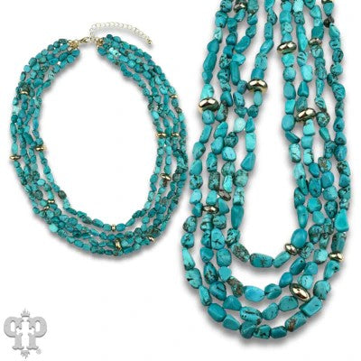 Pink Panache Afghan turquoise multi-strand necklace with 18K gold dipped bead accents and layered turquoise strands.