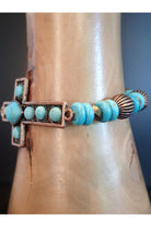 Emma Turquoise And Copper Stretch Cross Bracelet-Bracelets-Emma-Deja Nu Boutique, Women's Fashion Boutique in Lampasas, Texas